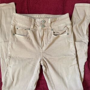 EUC AE JEANS . Size 0 . Mauve color